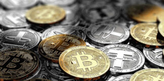 Activist Accused Of Funding Terror Group A collection of various cryptocurrency coins including Bitcoin and Tether