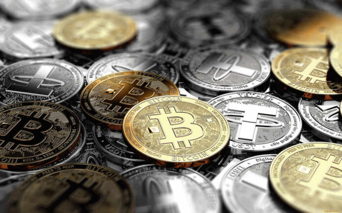 Cryptocurrency,In,The,Form,Of,Coins A collection of various cryptocurrency coins including Bitcoin and Tether