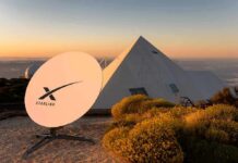 Closed-Door Plea Entangles Trump And Musk Starlink satellite dish near a pyramid-shaped building at sunset