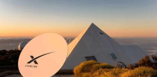 Closed-Door Plea Entangles Trump And Musk Starlink satellite dish near a pyramid-shaped building at sunset