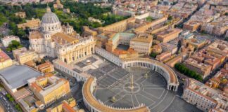 Rainbow Pilgrimage Marks Vatican First Aerial view of St. Peters Basilica and Vatican City with surrounding buildings