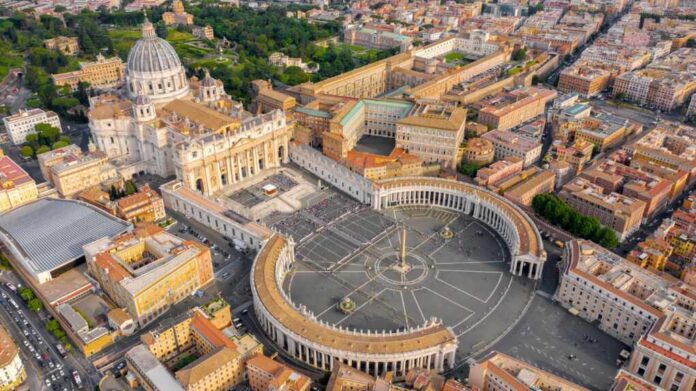 Aerial view of St. Peters Basilica and Vatican City with surrounding buildings