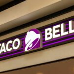 Taco Bell storefront sign with purple bell logo