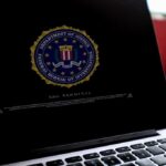Laptop screen displaying FBI seal