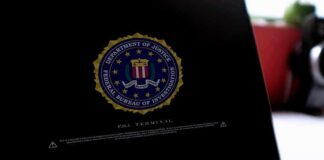 New Records Reignite Hunter Biden Laptop Fight Laptop screen displaying FBI seal