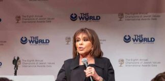Death Threats Trigger Federal Bust Woman speaking at a podium with microphone