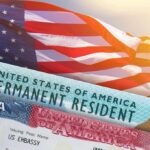 U.S. flag with visa and permanent resident cards