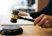 Pregnant Poisoning Horror Stuns Nashville Judge's hand holding a gavel over a sound block