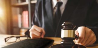 Federal Heat Targets Philly DA’s Office Judge with gavel striking sound block