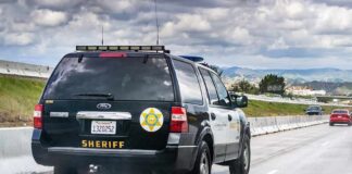 Sheriff SUV driving on a highway