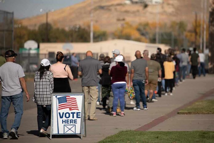 voters standing in a long line outside a polling place