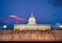Stunning Lapse Alleged In Kirk Shooting Utah State Capitol building at dusk with illuminated dome