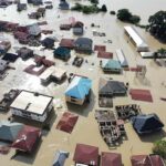 Aerial view of flooded residential neighborhood