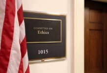 Office sign for Committee on Ethics with room number 1015