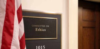 Office sign for Committee on Ethics with room number 1015