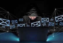Quiet Heist Hits 7 Million Kids’ Records Hooded person using a laptop surrounded by email icons