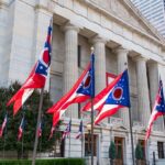 Ohio flags outside a neoclassical government building