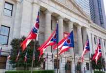 Ohio’s Blue Surge Spooks GOP Ohio flags outside a neoclassical government building