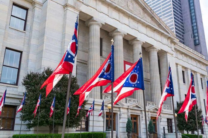 Ohio flags outside a neoclassical government building