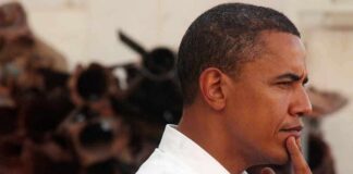 Pay Freeze Fury Hits Obama Hub Barack Obama in profile, touching his chin thoughtfully