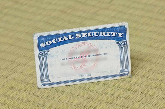 shutterstock_1456845554 Social Security card on a textured surface