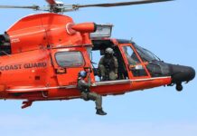 Nantucket Plane Mystery Takes New Turn Rescue helicopter with crew performing hoist operation