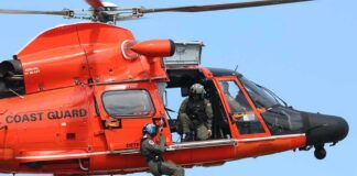 Nantucket Plane Mystery Takes New Turn Rescue helicopter with crew performing hoist operation