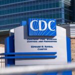 CDC headquarters sign outside modern office buildings