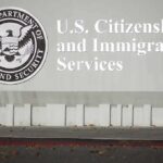 USCIS building sign with DHS seal