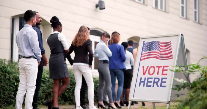 voters standing in line outside a polling place