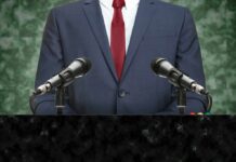 speaker at podium with microphones